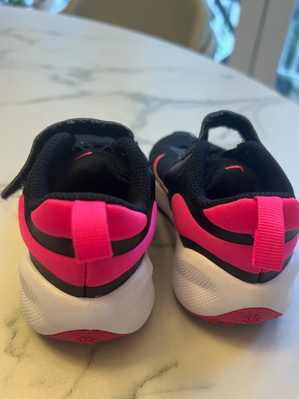 Nike Kids 9C Black Sneakers with Pink Swoosh and heel detail